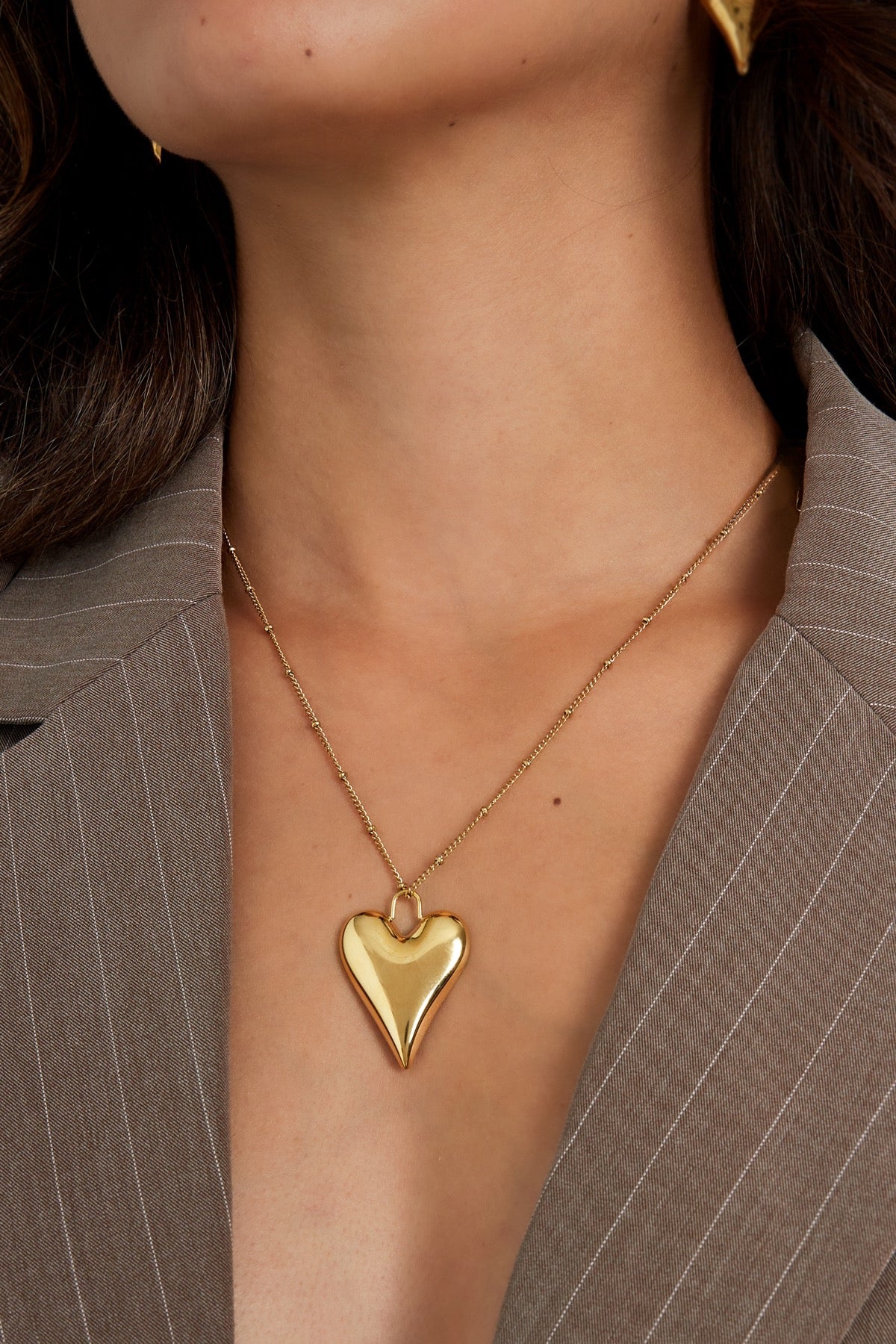 Heartfelt charm ketting goud