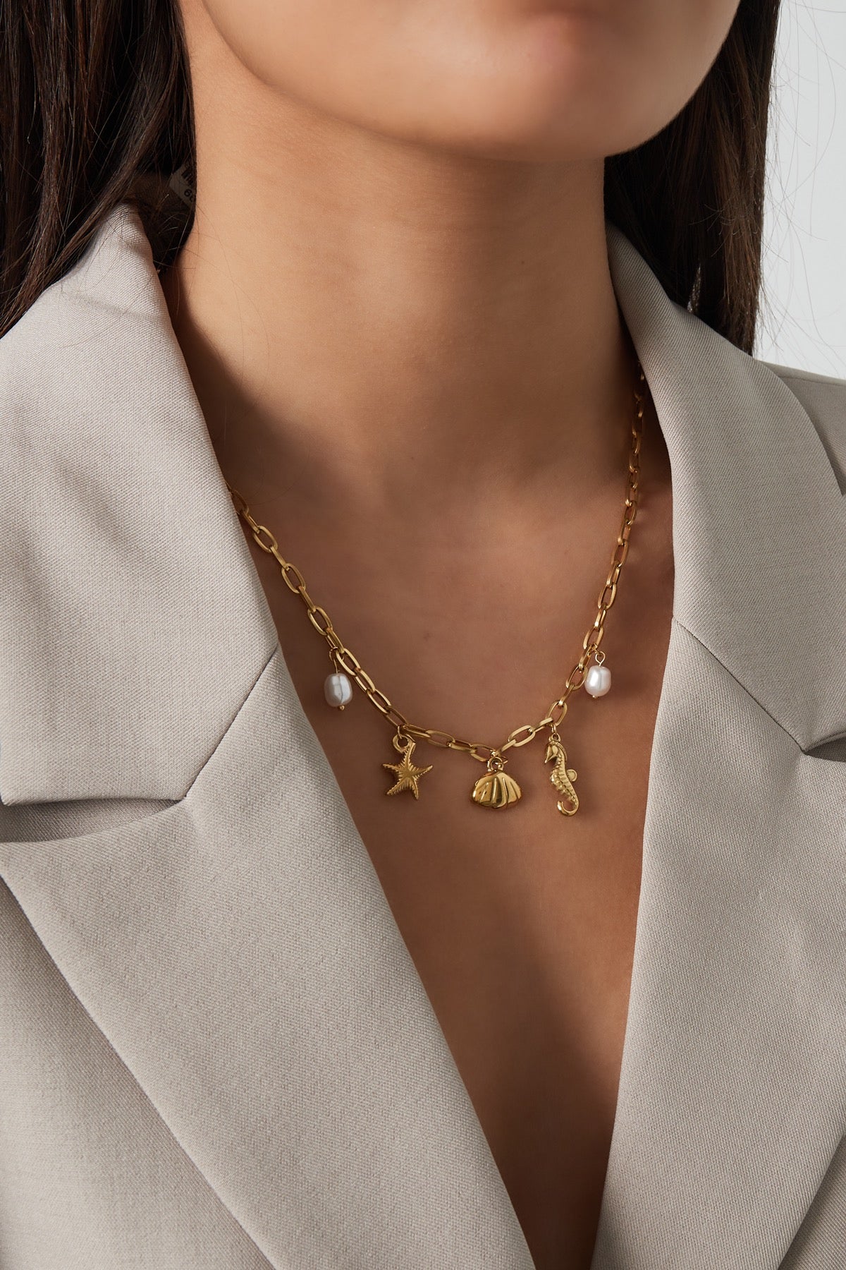 Strand bedels ketting goud