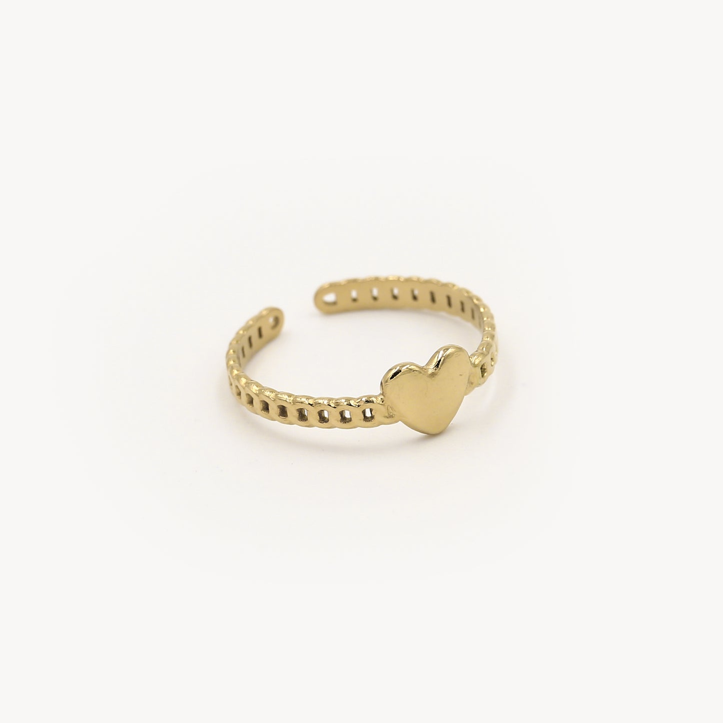Schakel ring met hartje goud