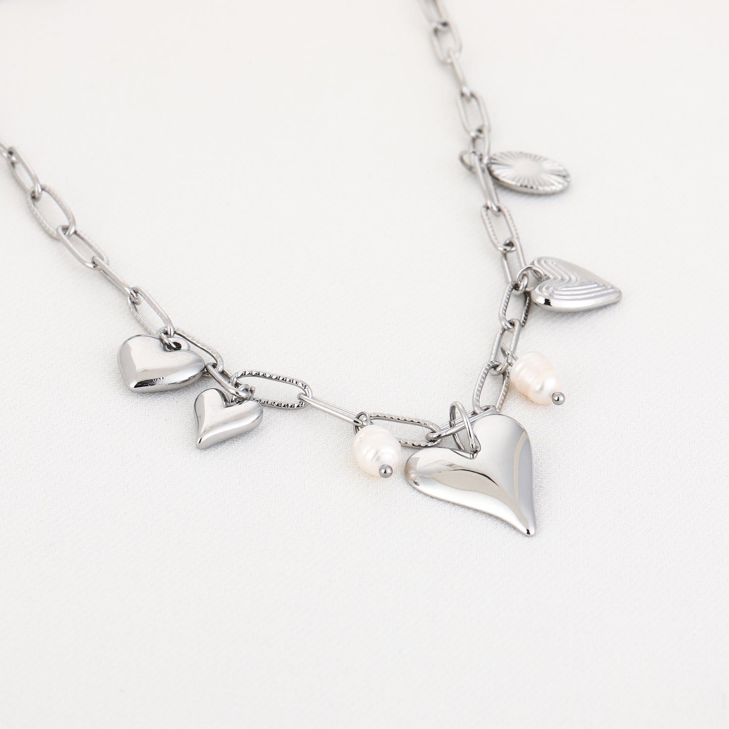 Hartjes bedels ketting zilver
