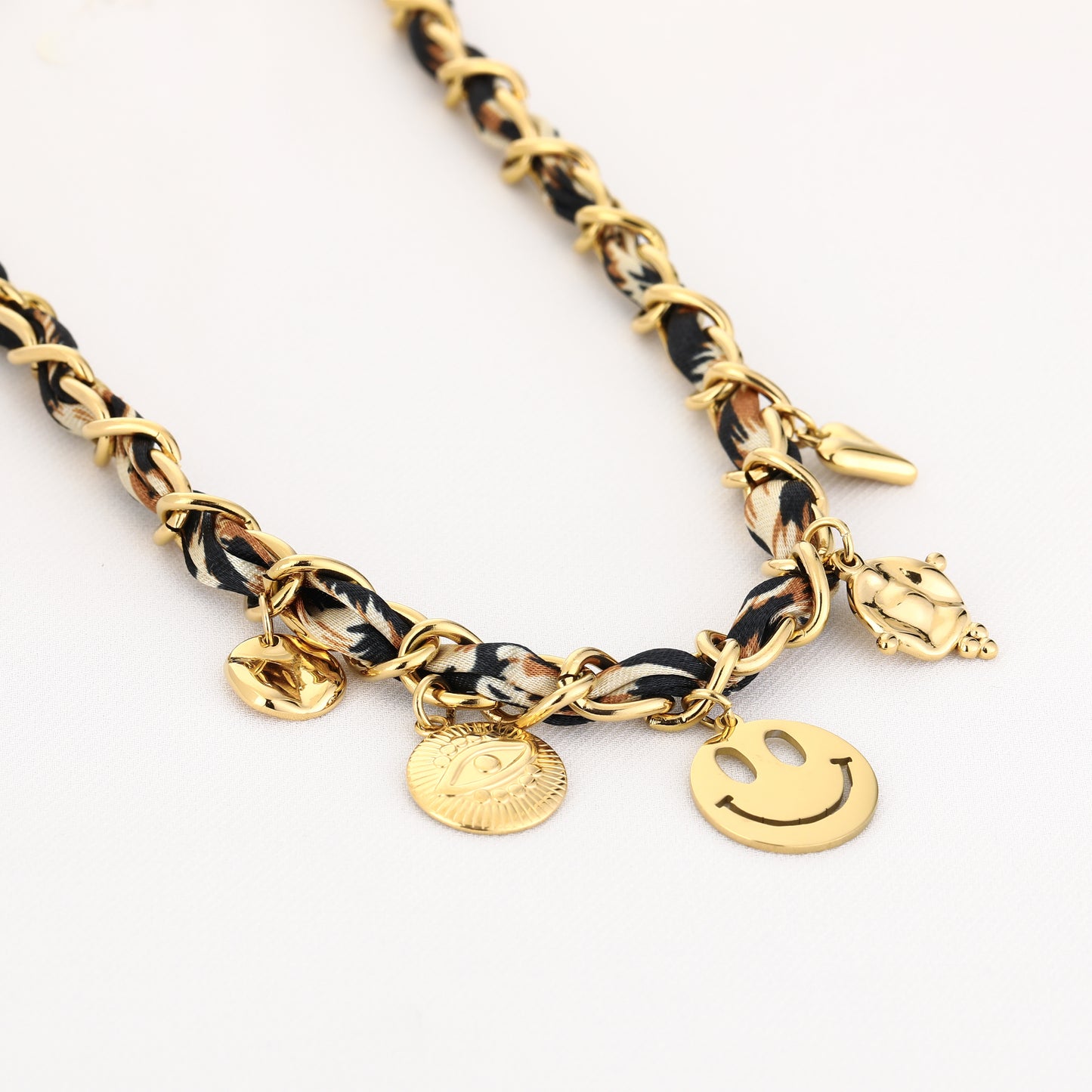 Panter met smiley bedel ketting goud