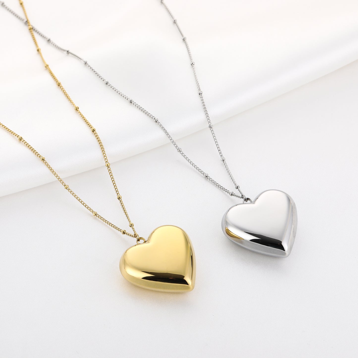 Lange ketting met XL hart bedel