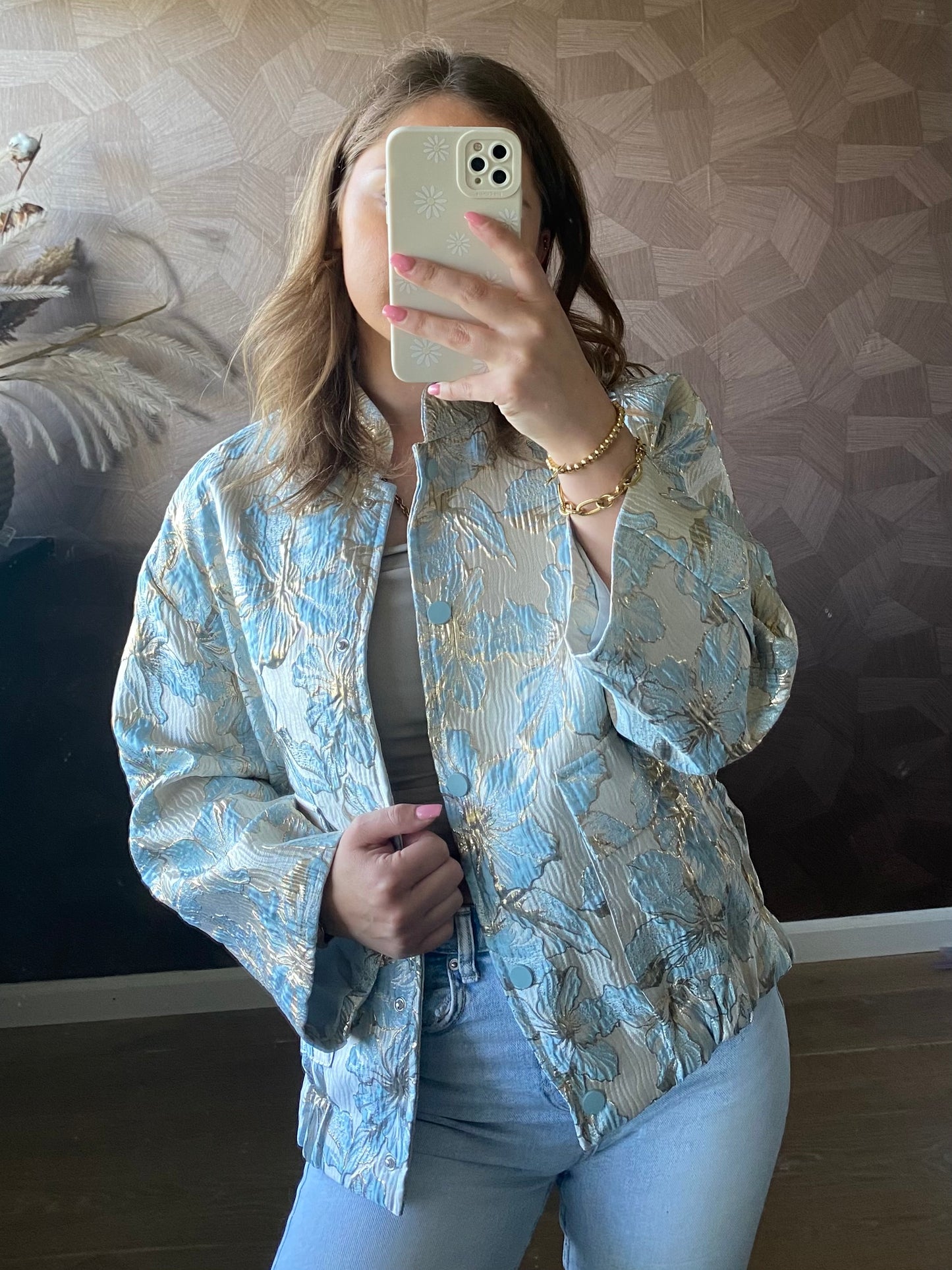 Jacquard stof met blauwe bloemenprint en subtiele gouden accenten - luxe uitstraling
