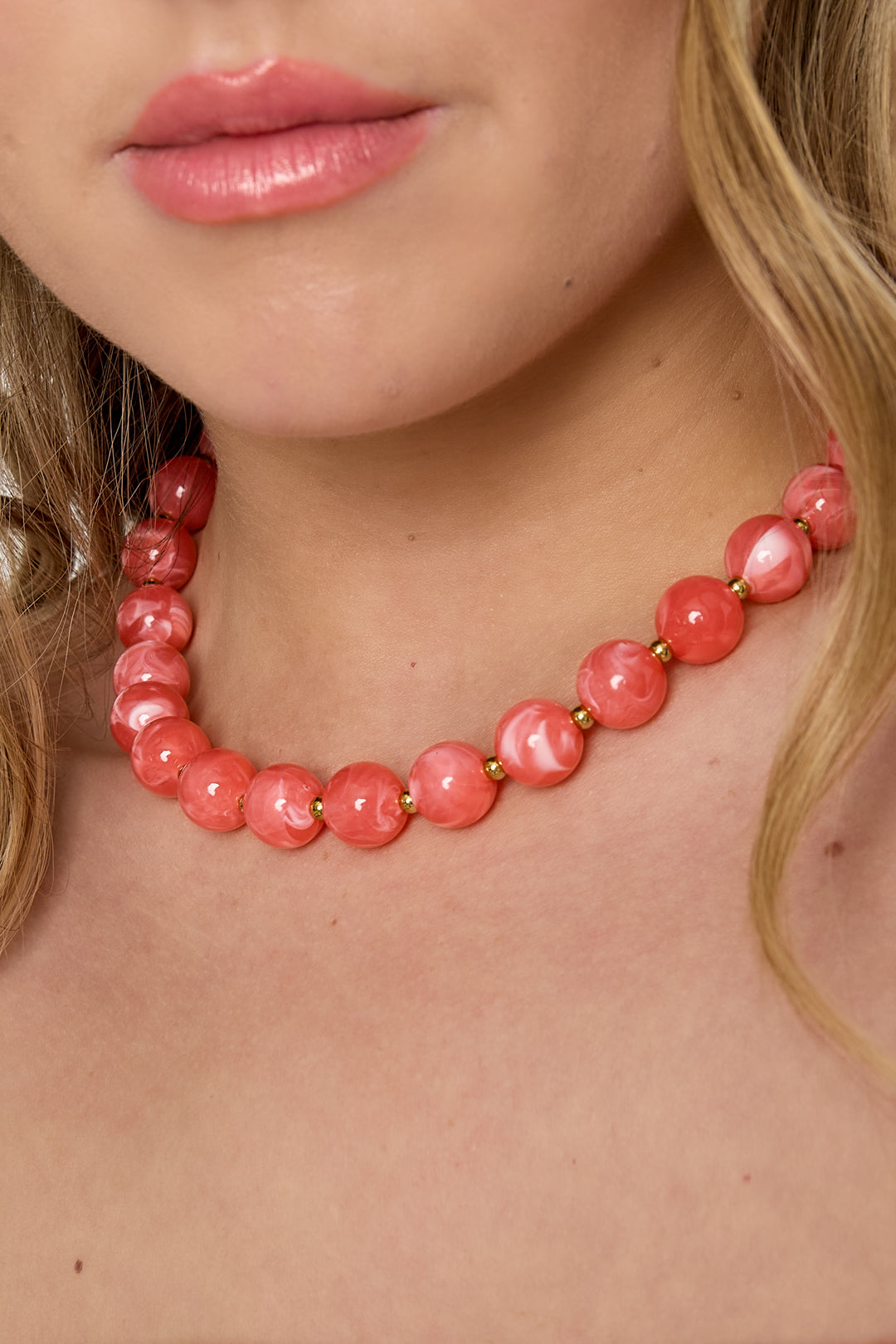 Kralenketting met gouden kraaltjes roze