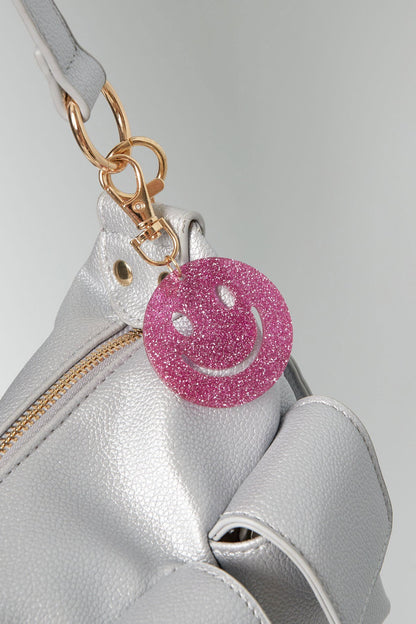 Keep smiling sleutelhanger roze