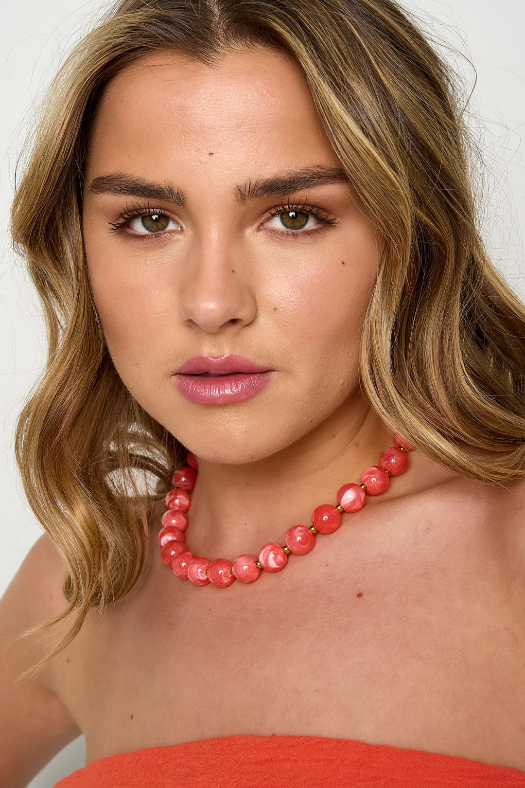 Kralenketting met gouden kraaltjes roze