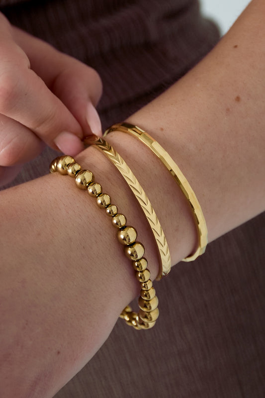 Bangle armband met patroon goud