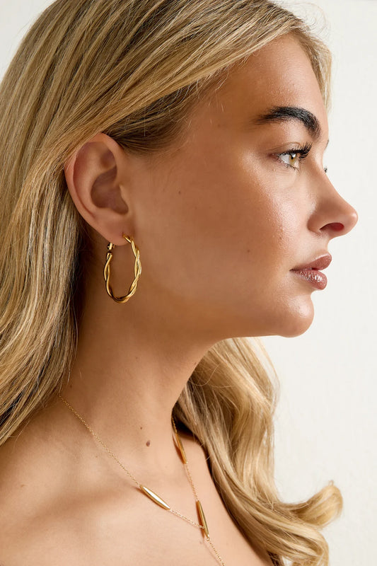 Twisted hoops oorbellen goud