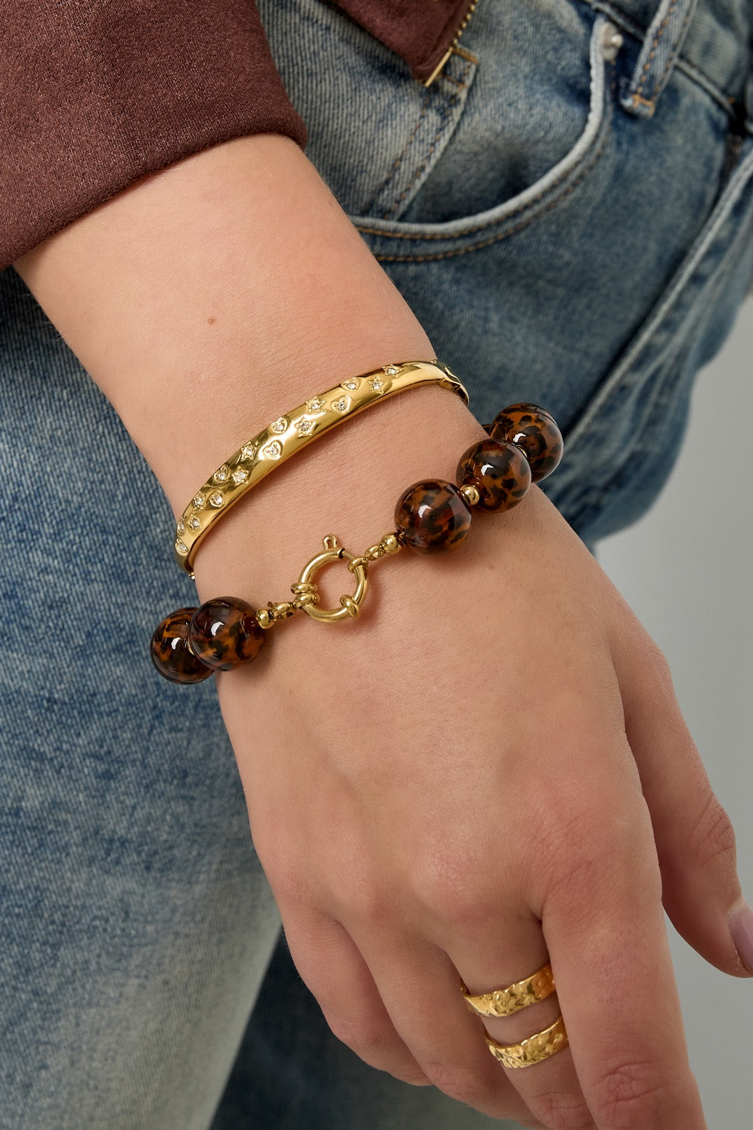 Bangle armband hartjes en sterren goud