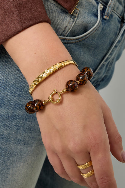 Bangle armband hartjes en sterren goud