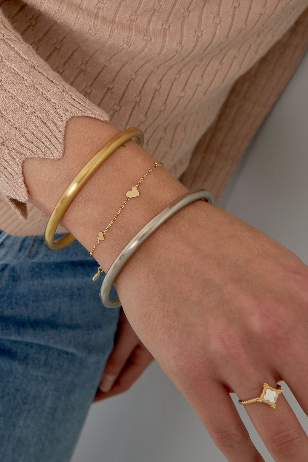 Klassieke hartjes armband goud