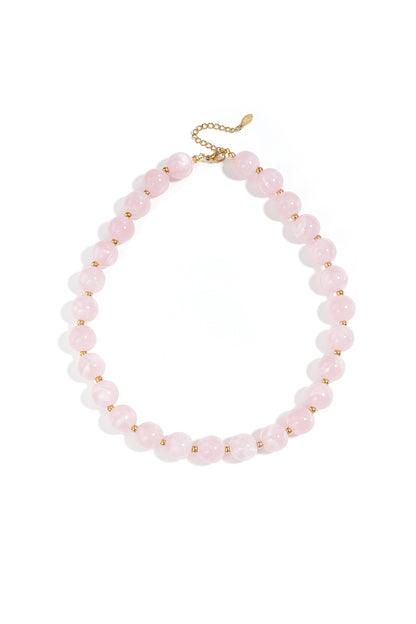 Kralenketting met gouden kraaltjes roze