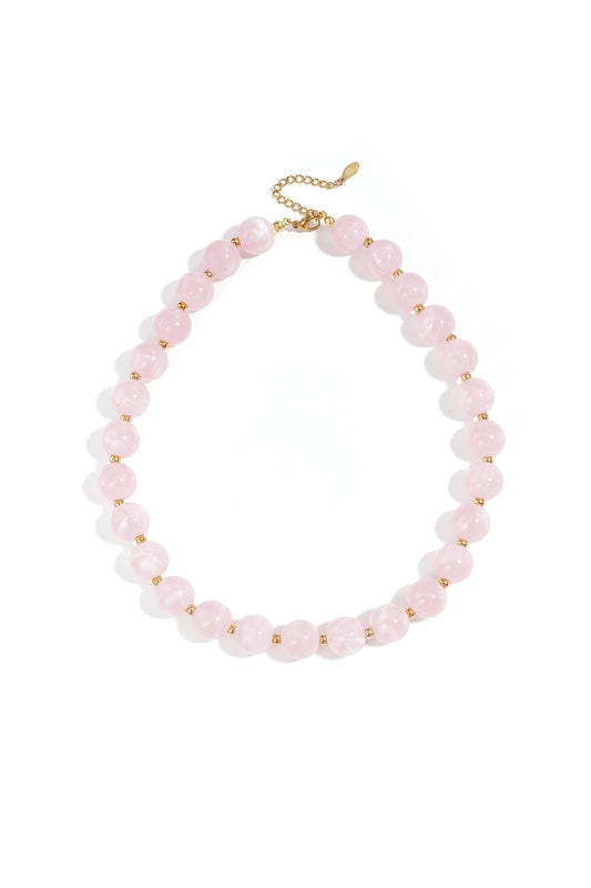 Kralenketting met gouden kraaltjes roze