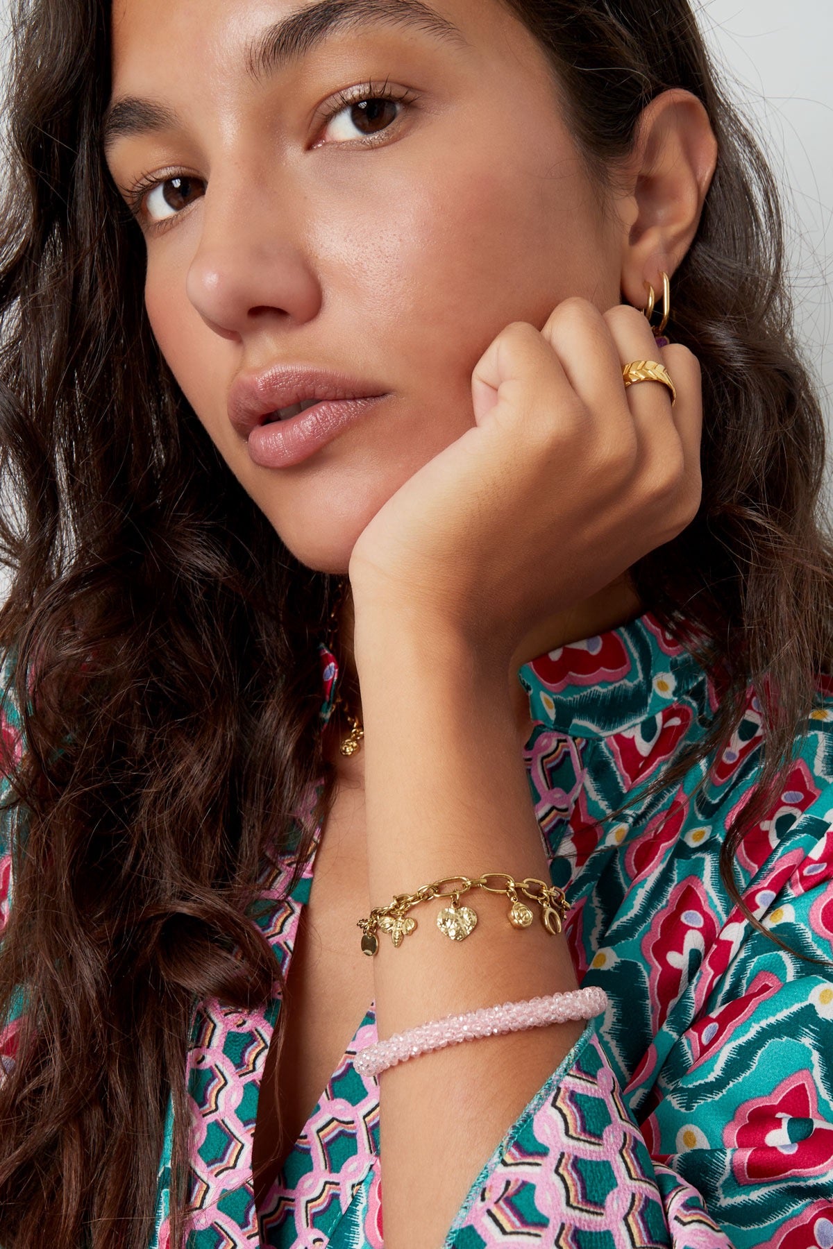 Schakels met bedels armband goud