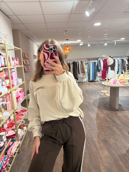 Beige oversized Champagne Club sweater met opdruk.  