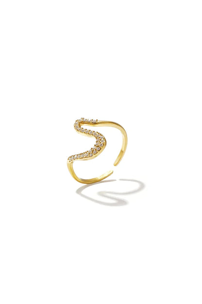 Belegde swoosh ring goud