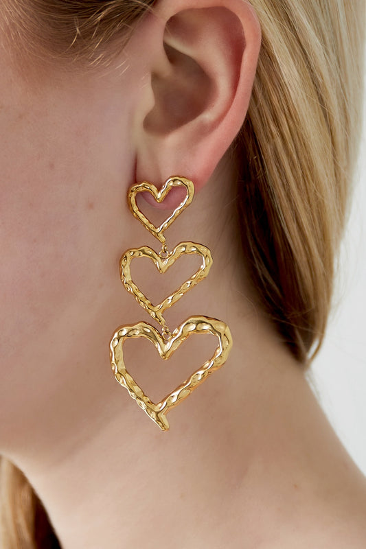 Open hartjes oorbellen goud