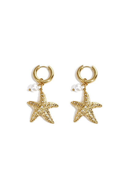 Ringen met zeester en parel oorbellen goud