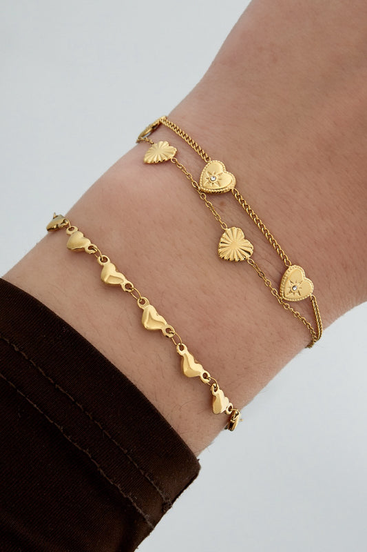 Multi hearts armband goud