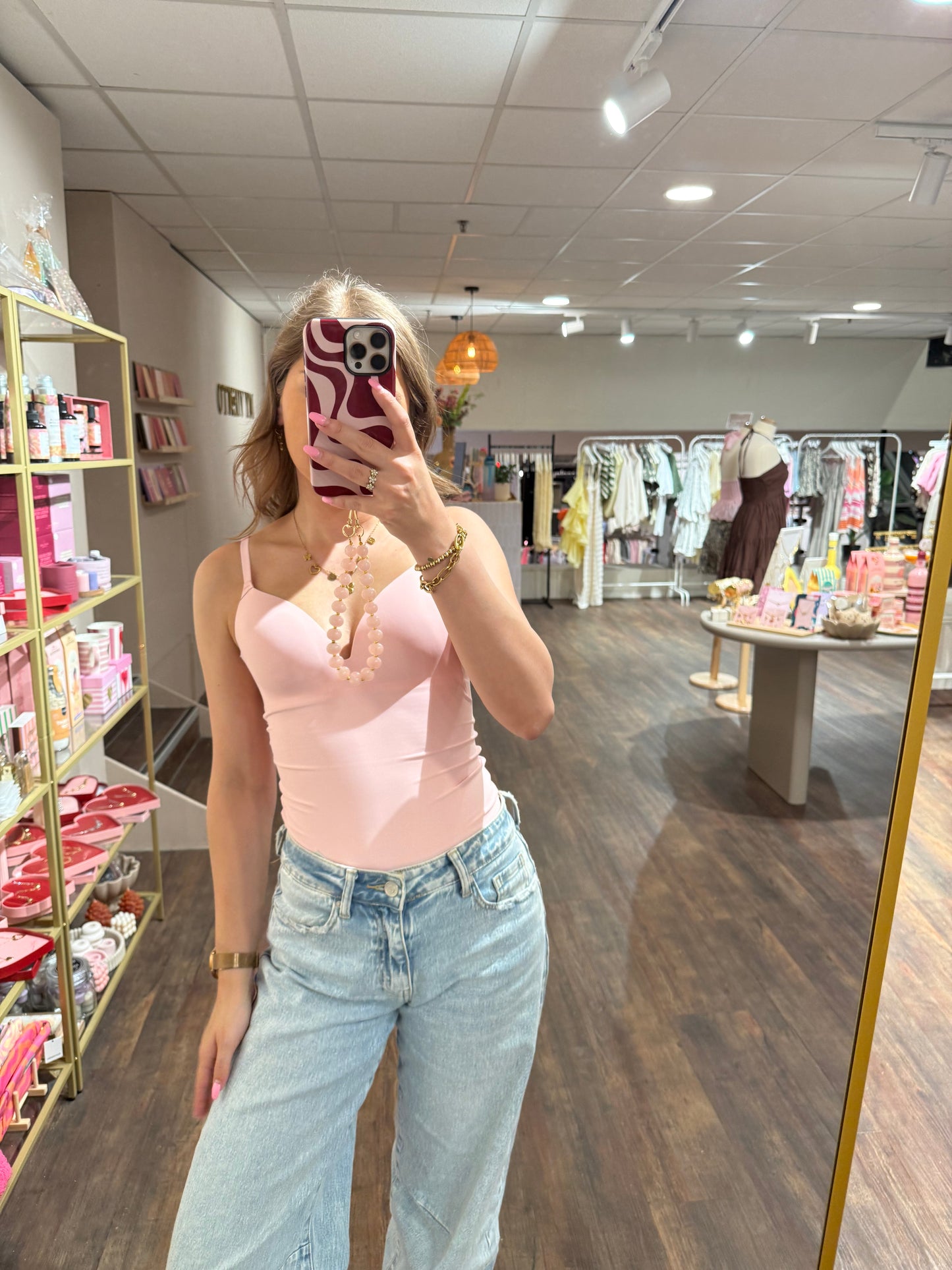 Corrigerende body voor dames in roze