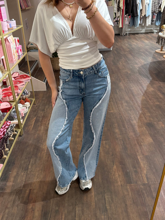 Demi swirl wide leg jeans met ruffle wave details 