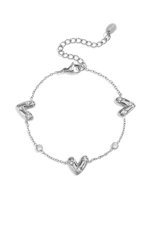 Drie belegde harten en ronde zirkonia steentjes armband zilver