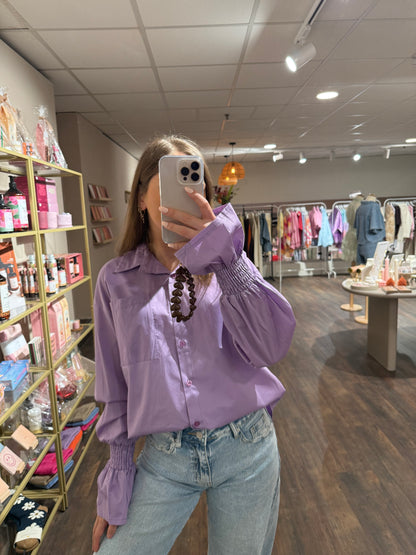 Elegante paarse top voor elke outfit.