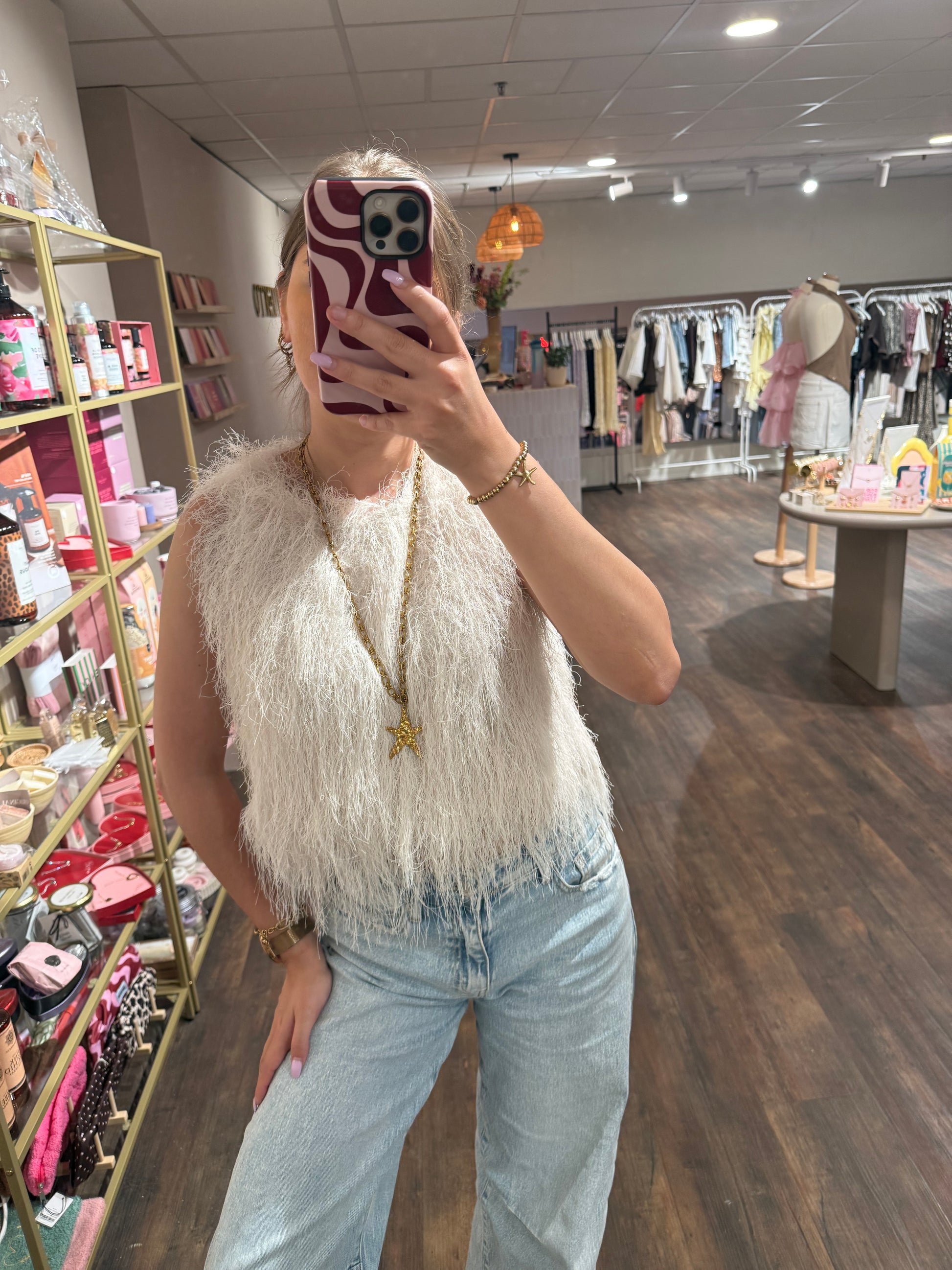 Boho haltertop met fringe details. 
