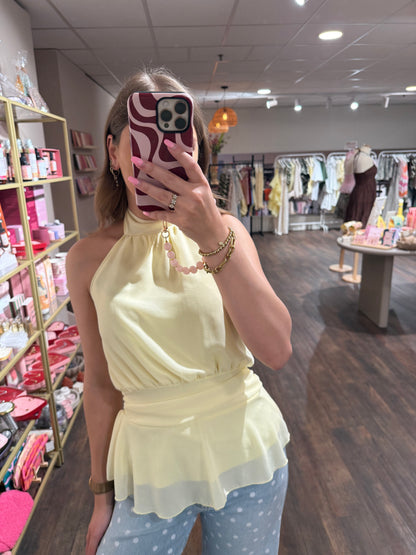 Gele haltertop met getailleerde taille