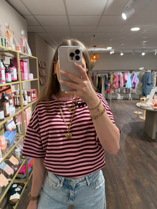 Gestreept shirt in bordeaux en roze tinten.