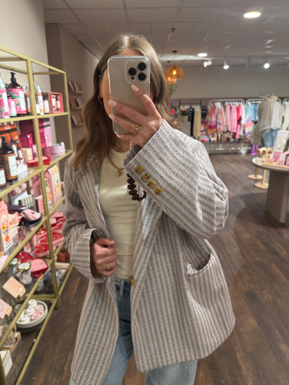 Trendy dames blazer met subtiel glitterdetail.