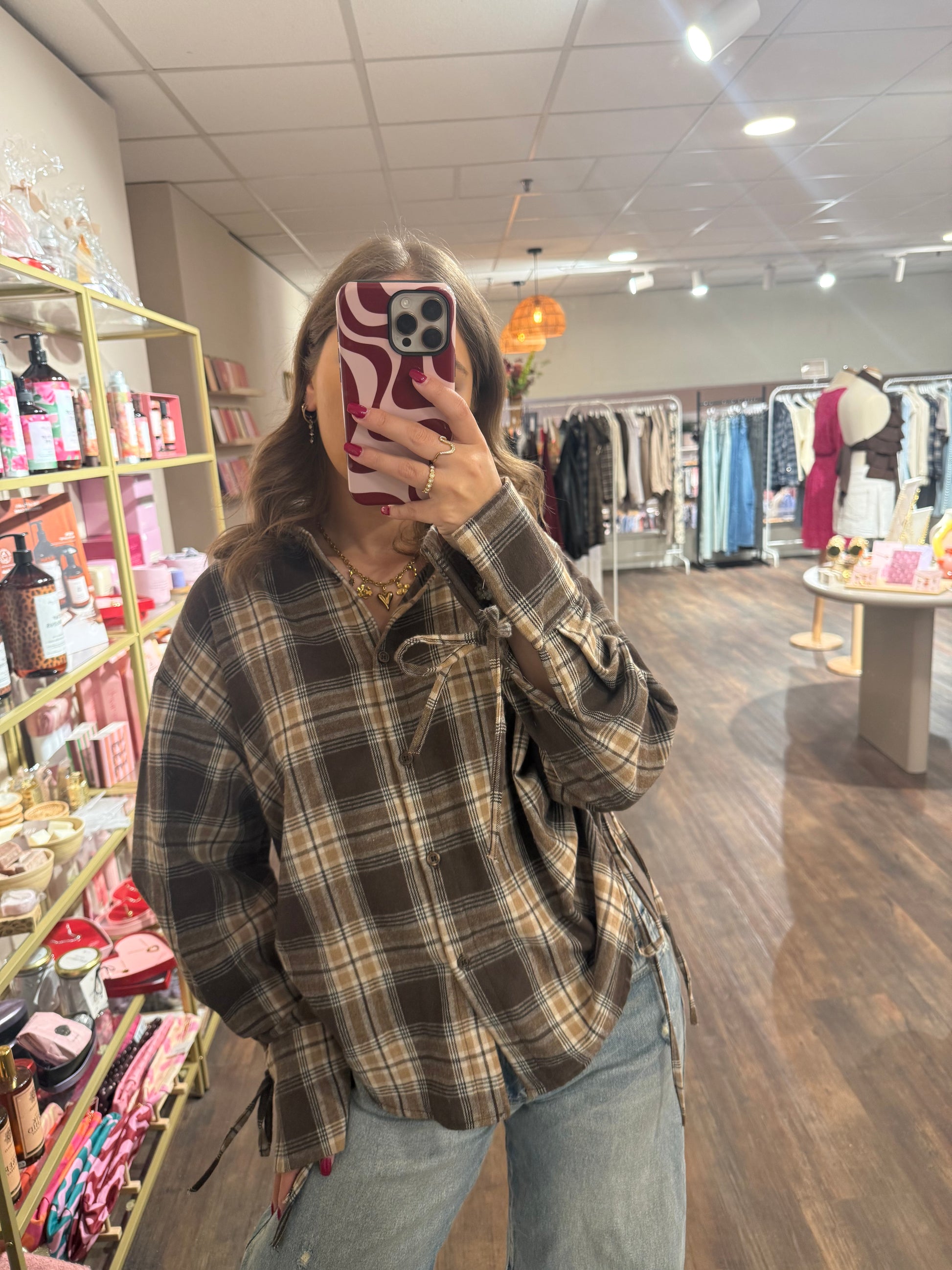 Geruite damesblouse met touwtjes in de taille.  