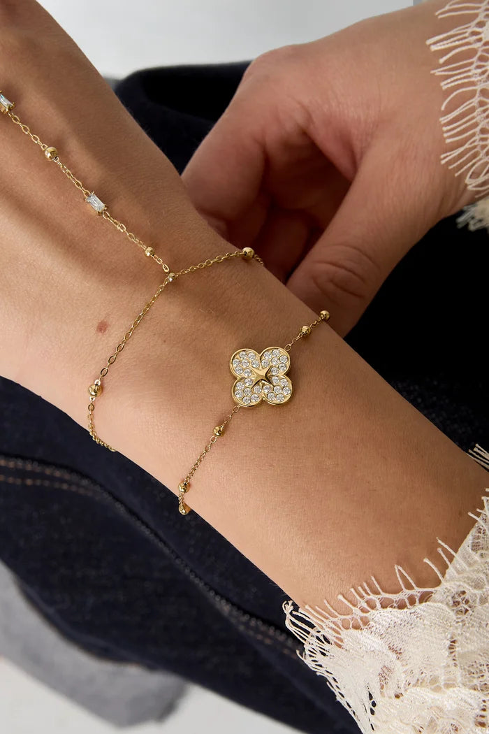 Grote belegde bloem armband goud