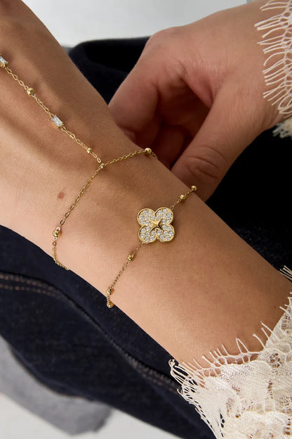 Grote belegde bloem armband goud
