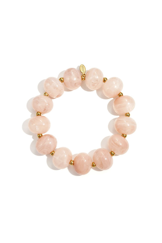 Elastieke kralenarmband met grote kralen lichtroze