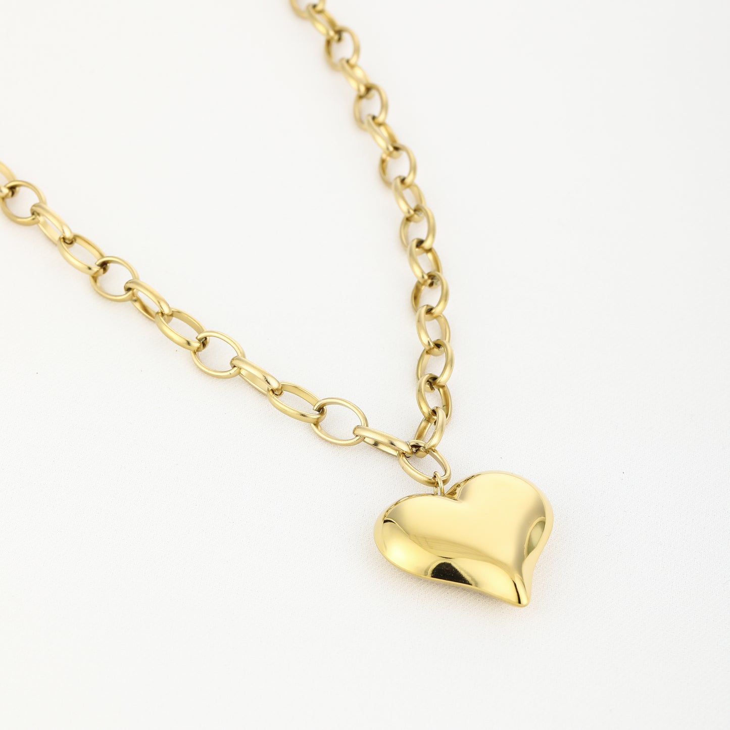 Lange hart ketting goud