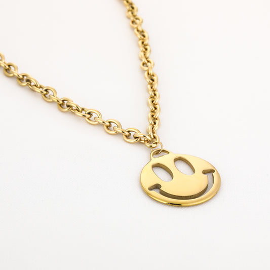 Lange smiley ketting goud