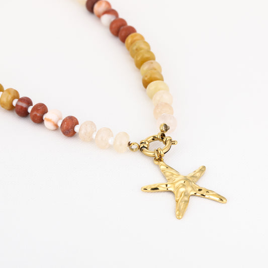 Beige kralen met gouden zeester