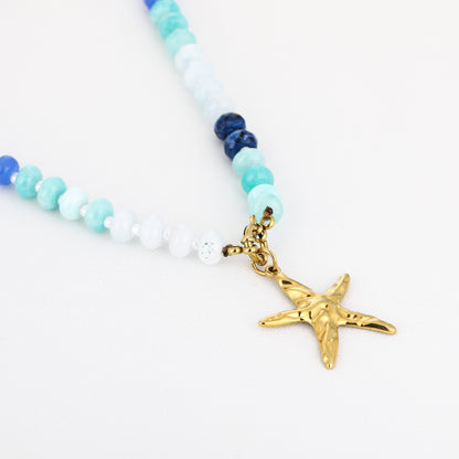 Blauwe kralen met gouden zeester