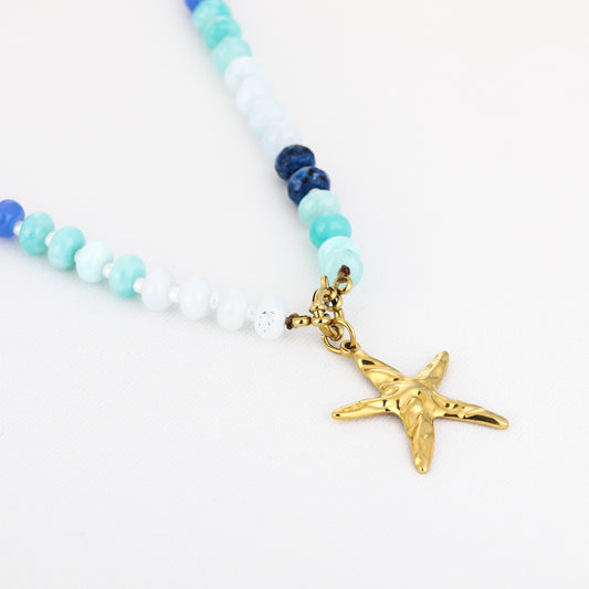 Blauwe kralen met gouden zeester