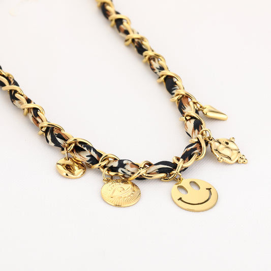 Panter met smiley bedel ketting goud