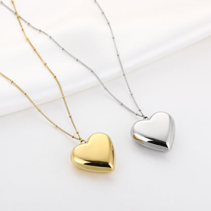 Lange ketting met XL hart bedel