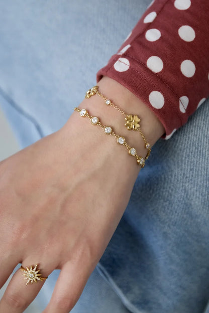 Klaver met afwisselende steentjes armband goud