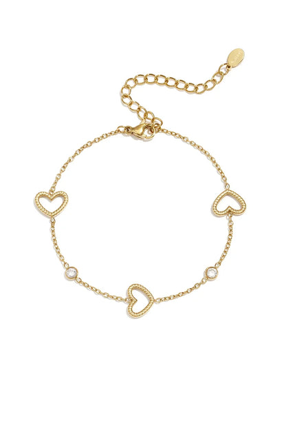 Open harten met steentjes armband goud