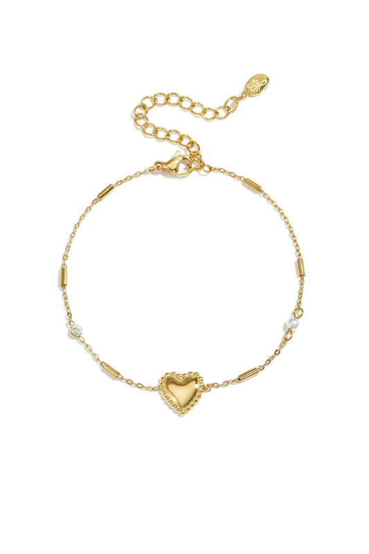 Parel, steentje en statement hart armband goud
