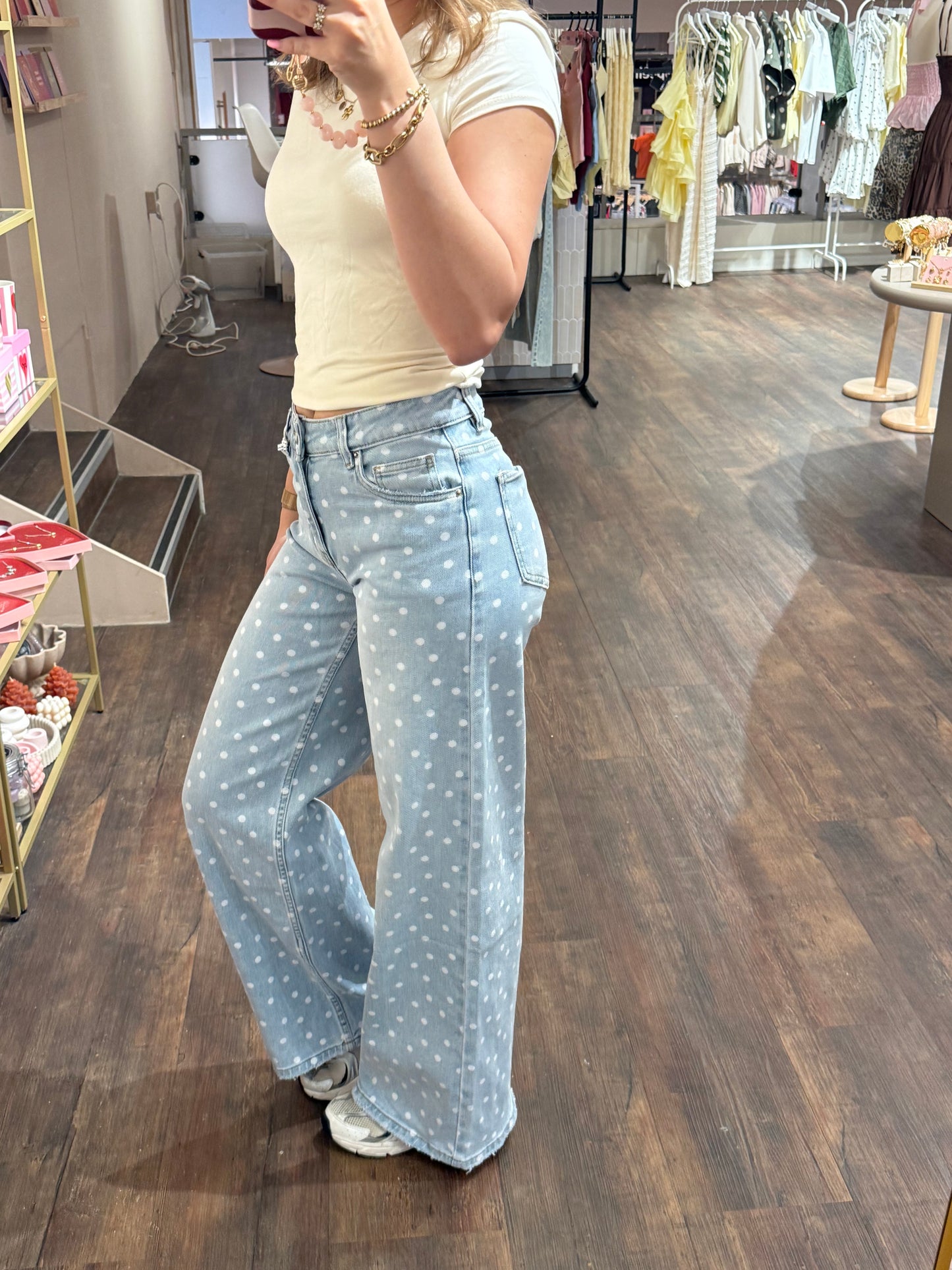 Dames jeans met wide leg pasvorm en stippen