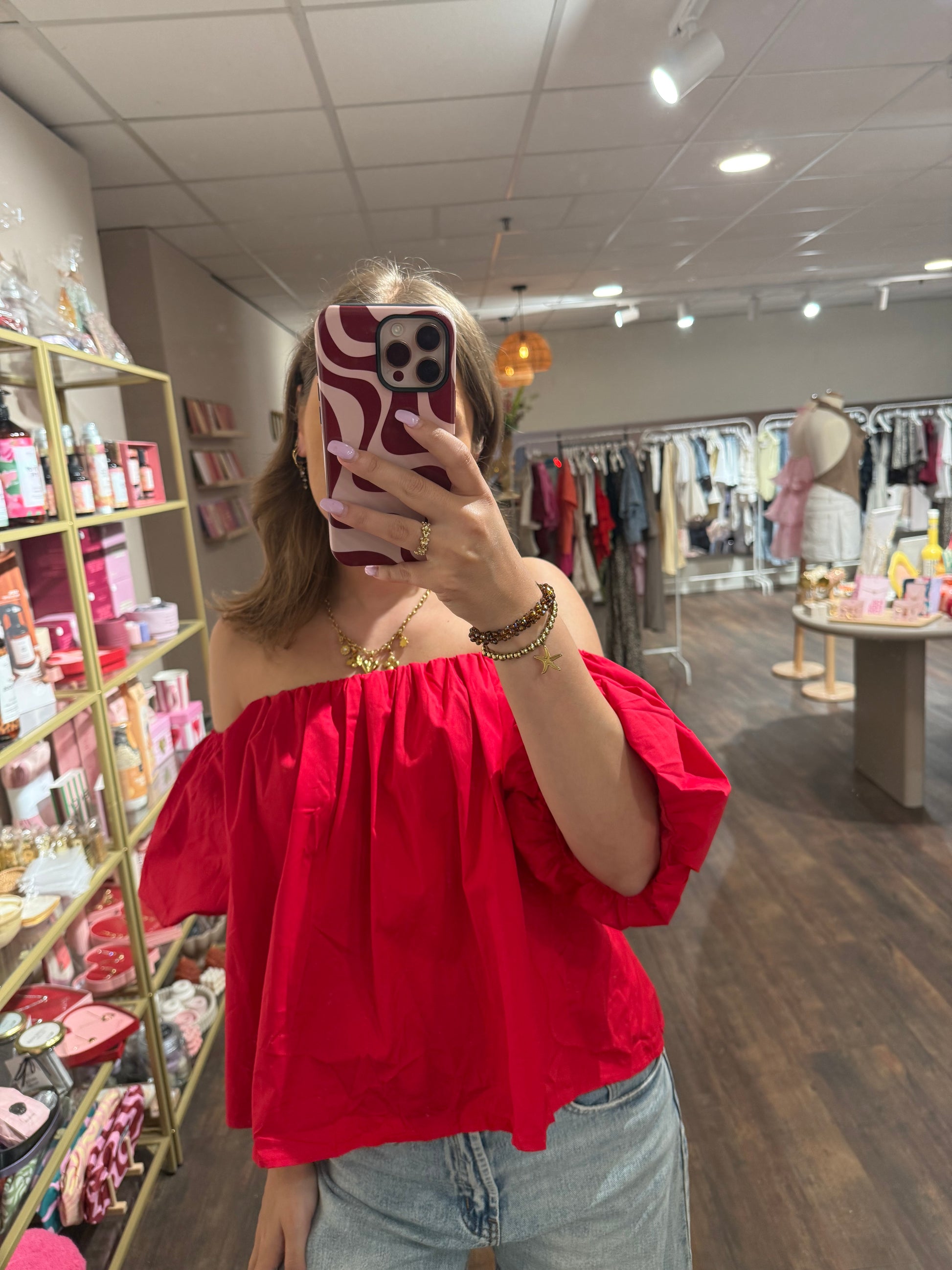 Off shoulder top in rode kleur 
