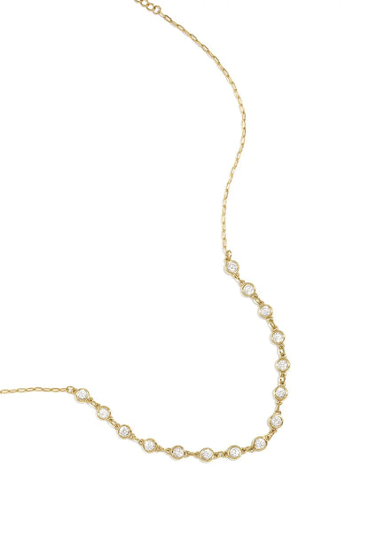 Ronde zirkonia steentjes ketting goud