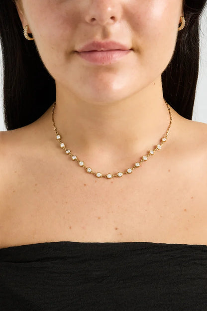 Ronde zirkonia steentjes ketting goud