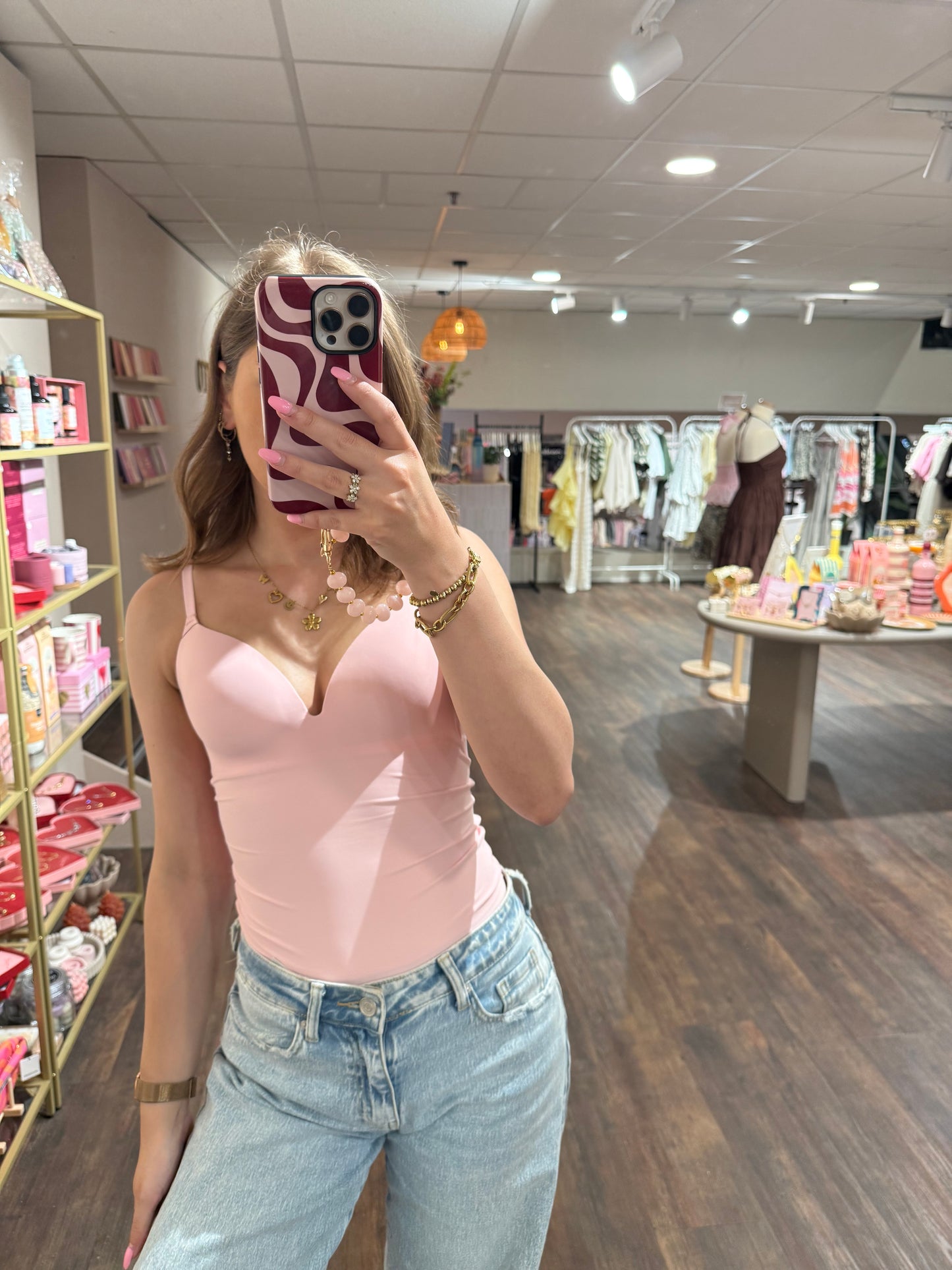 Roze shapewear body met voorgevormde cups